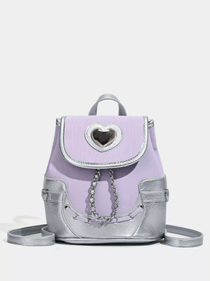 Charming mini heart flap backpack in purple with silver accents and chain detail.