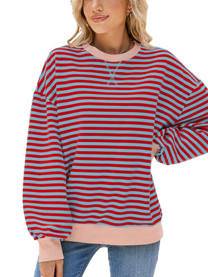 Striped crew neck sweatshirt in red and light blue with pink trim.