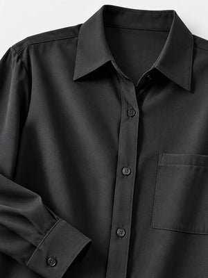 White relaxed button-up shirt with collared