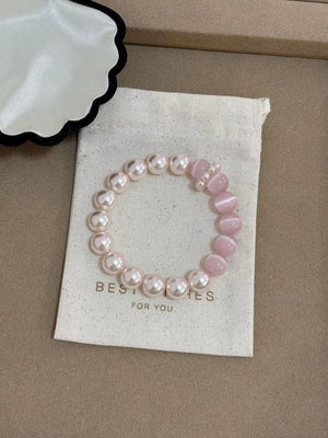 Synthetic Pearl,Cat' bracelet in Blush Pink with fitted silhouette