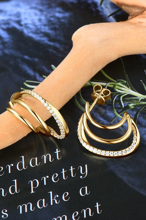 Gold triple hoop diamond stud earrings with pave-set stones