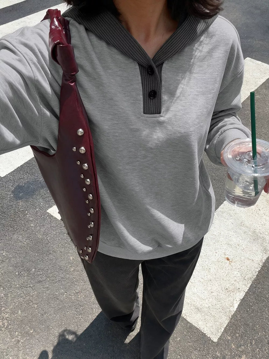 light grey pullover hoodie with hip-length and pullover