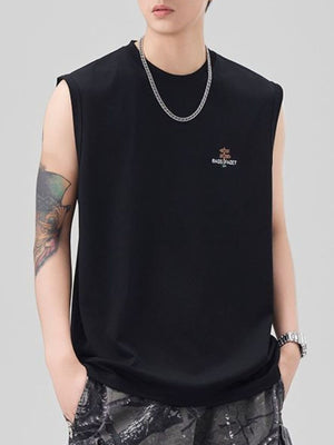 Men's black oversized cotton tank top with small chest logo detail.