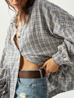 Black button-down shirt with hip-length and button-front