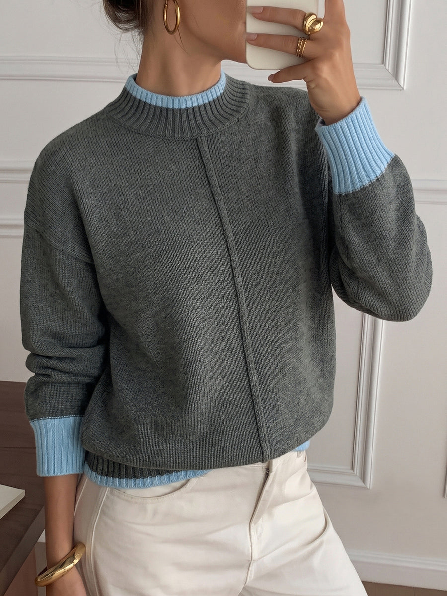 100% acrylic Care instructions: Machine wash cold crewneck sweater in light blue with relaxed silhouette