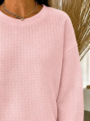 sweatshirt featuring waffle knit in Black with 100% polyester Care instructions: Machine wash cold texture