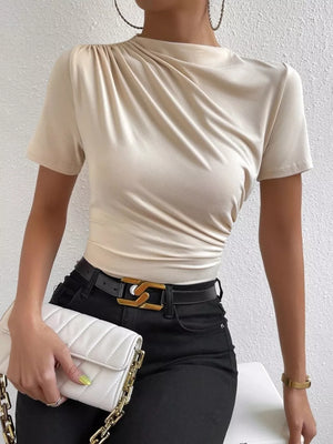 Apricot ruched mock neck t-shirt with draped detail and short sleeves.