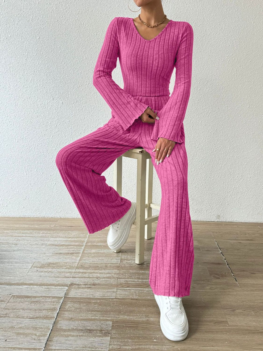 Hot Pink ribbed knit loungewear set with flared sleeves and pants.