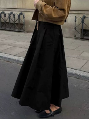 100% polyester Care instructions: Machine wash cold A-line skirt in Black with A-line silhouette