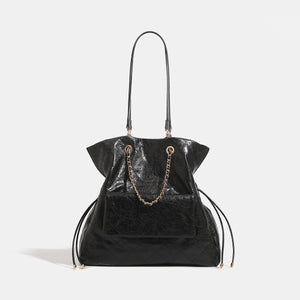 black backpack with drawstring and geometric
