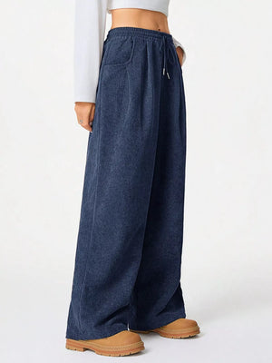 Blue corduroy pants with drawstring waist and wide leg