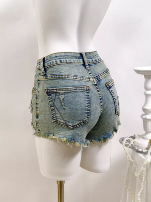 denim shorts in Light with distressed and mini