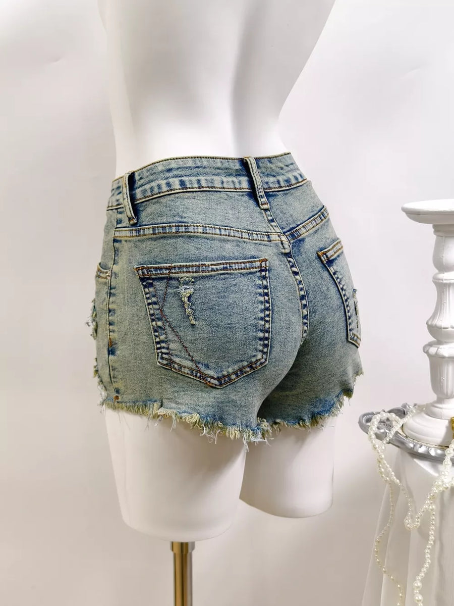 denim shorts in Light with distressed and mini