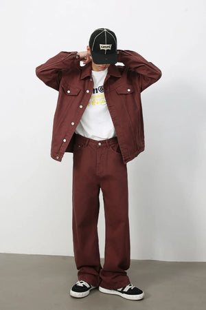 Burgundy wide-leg denim trousers with a relaxed fit.
