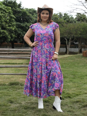 Vibrant floral tiered maxi dress with cap sleeves and cinched waist.