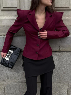 blazer in black with sharp shoulders and hip-length