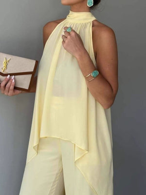 100% polyester Care instructions: Machine wash cold two-piece set in Light Green with relaxed top with wide-leg pants