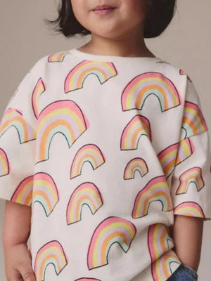 Toddler t-shirt with pastel rainbow print, crewneck, short sleeves, and cotton fabric.