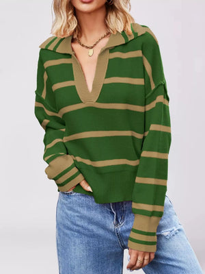 orange pullover sweater with exposed seam and long sleeve