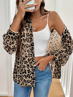 black button-down shirt featuring button cuffs and leopard
