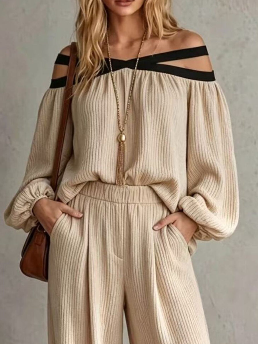 Black two-piece set featuring pocketed and ribbed