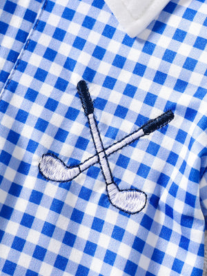 Baby dress with blue gingham pattern, polo collar, and embroidered golf clubs.