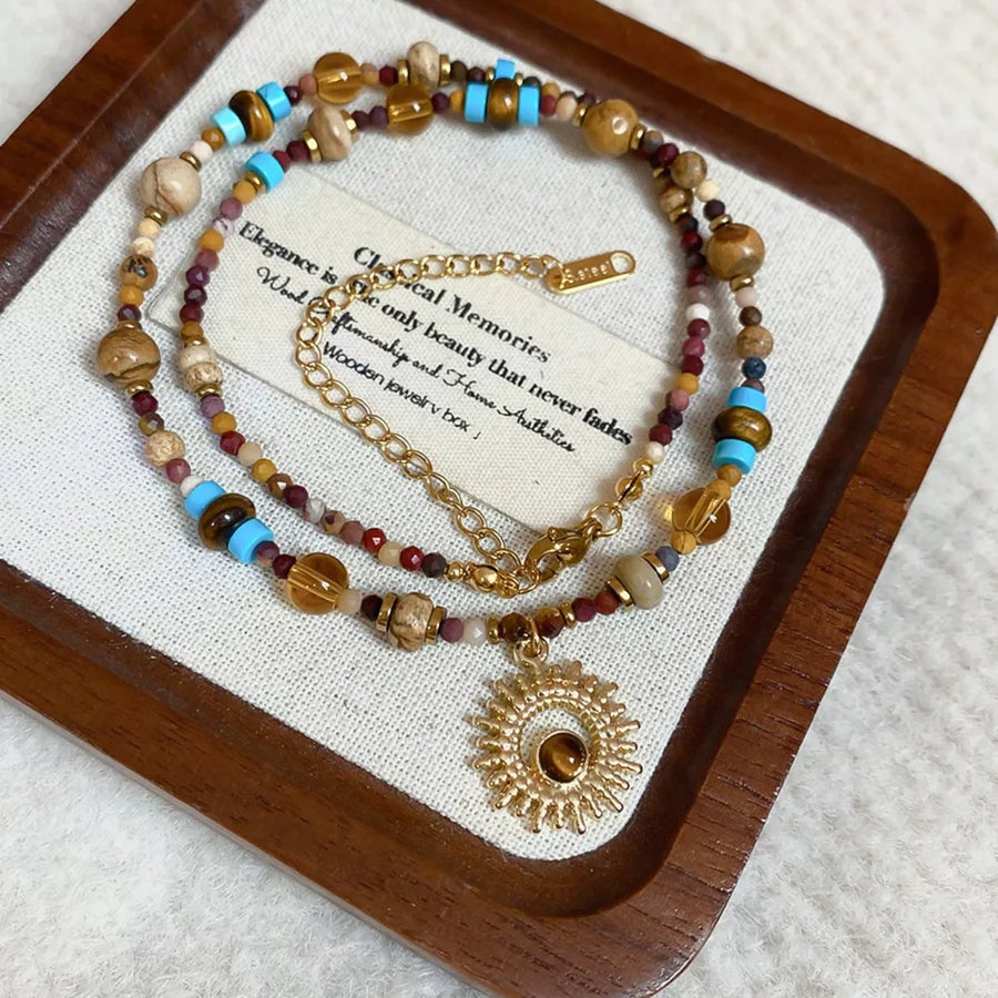 necklace featuring motif in gold with 18K Gold-Plated, Natural stone, Titanium Steel, Beads Care instructions: Avoid w