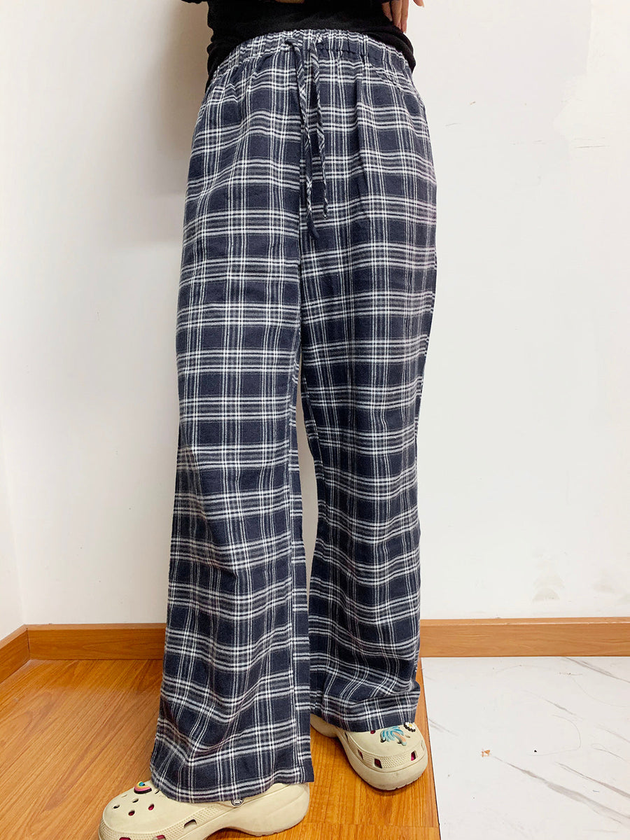 Relaxed plaid drawstring palazzo pants in dusty blue with a wide leg and casual fit.