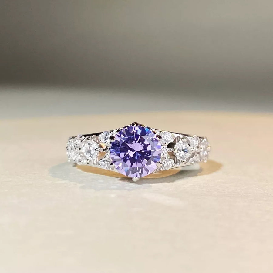ring in lavender featuring faceted stones and straight fit
