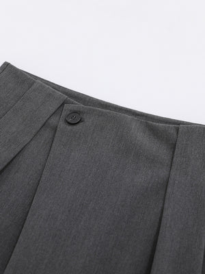 Men's High-Waisted Asymmetric Pleated Capris in charcoal gray with high-waisted