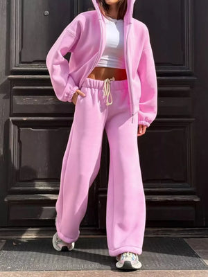 zip hoodie in light pink featuring drawstring and relaxed fit