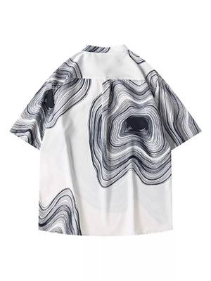 White oversized men's shirt with abstract black wave print and band collar.