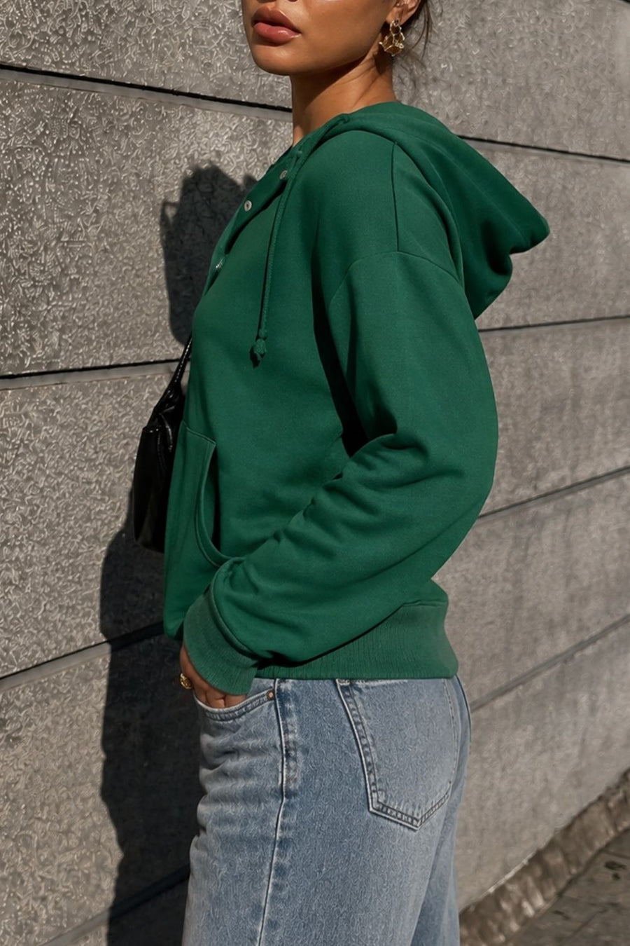 forest green pullover hoodie with hip-length and snap