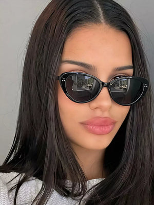 PC Frame material: Polycarbonate Lens material: TAC Temple material: Polycarbona sunglasses in brown with cat-eye silhouette