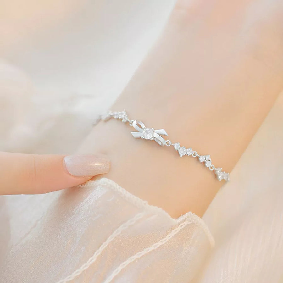 silver with bracelet with bow detail