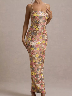 Maxi dress with floral sequin embellishments, spaghetti straps, and a bodycon fit.