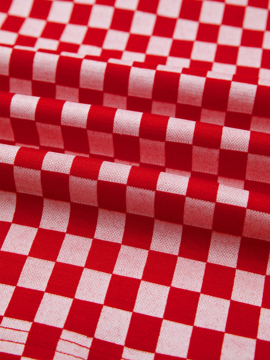 Red and white checkered print shirt with ruffle sleeves detail