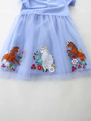 Baby blue tulle dress with horse and flower embroidery detail