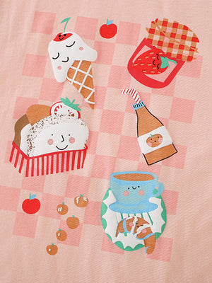Toddler graphic tee with ice cream, cupcake, and fruit graphics on pink checkered cotton.