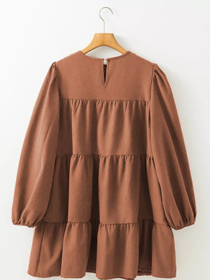 90% polyester, 10% elastane Care instructions: Machine wash cold mini dress in rust brown with relaxed silhouette