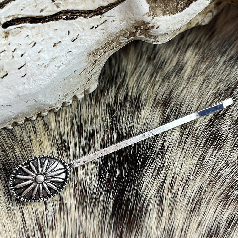 Turquoise Blossom hair pin set in alloy with a sunburst design, boho style.