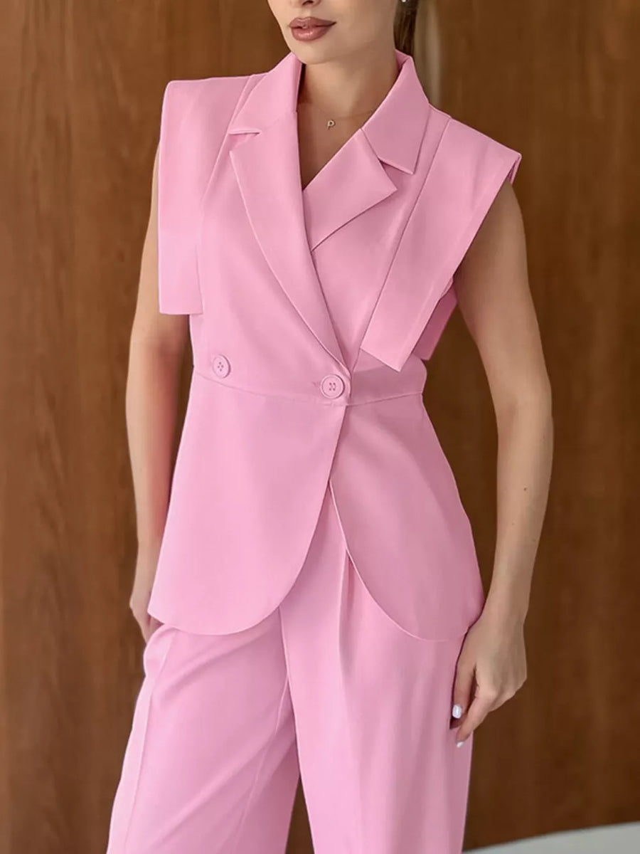 95% polyester, 5% spandex Care instructions: Machine wash cold two-piece set in Pink with fitted top, wide-leg bottom