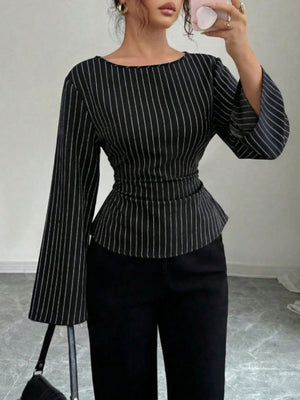 white blouse featuring peplum and striped