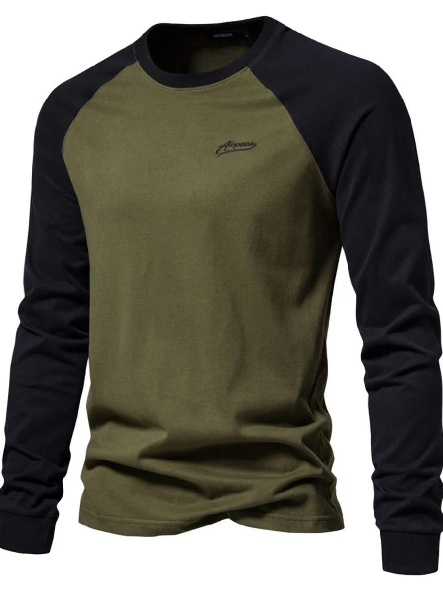 Army green and black colorblock raglan long sleeve tee with embroidered logo.