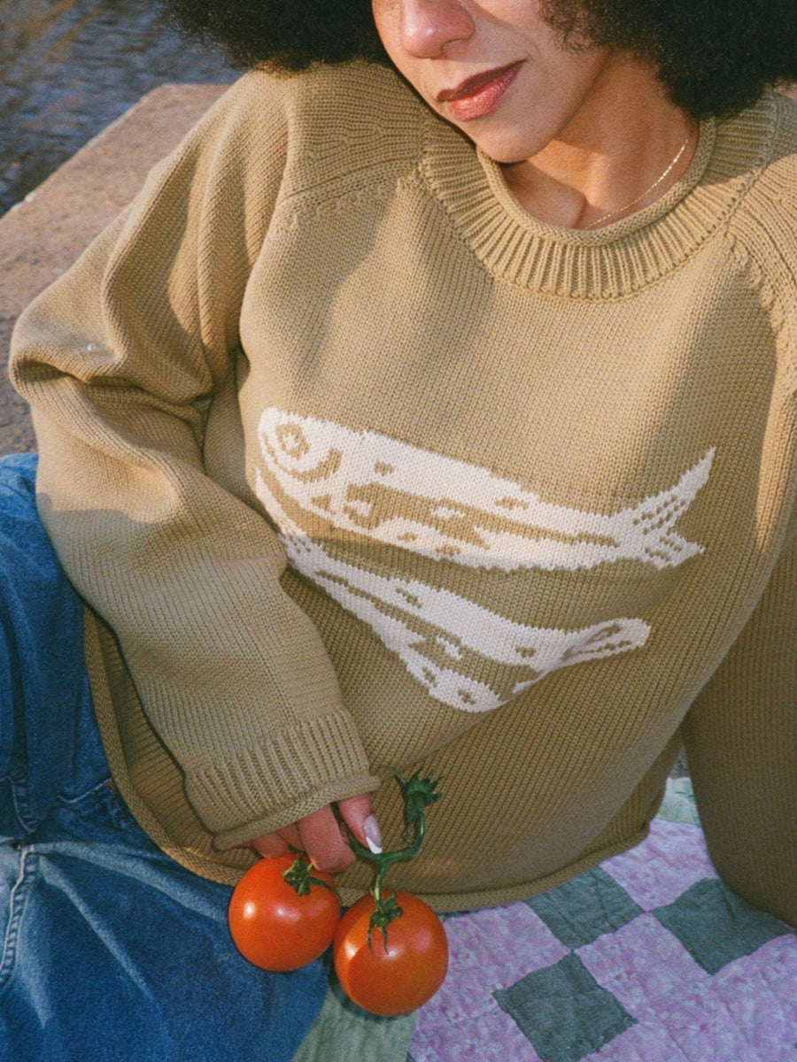 Red crewneck sweater with pullover and fish