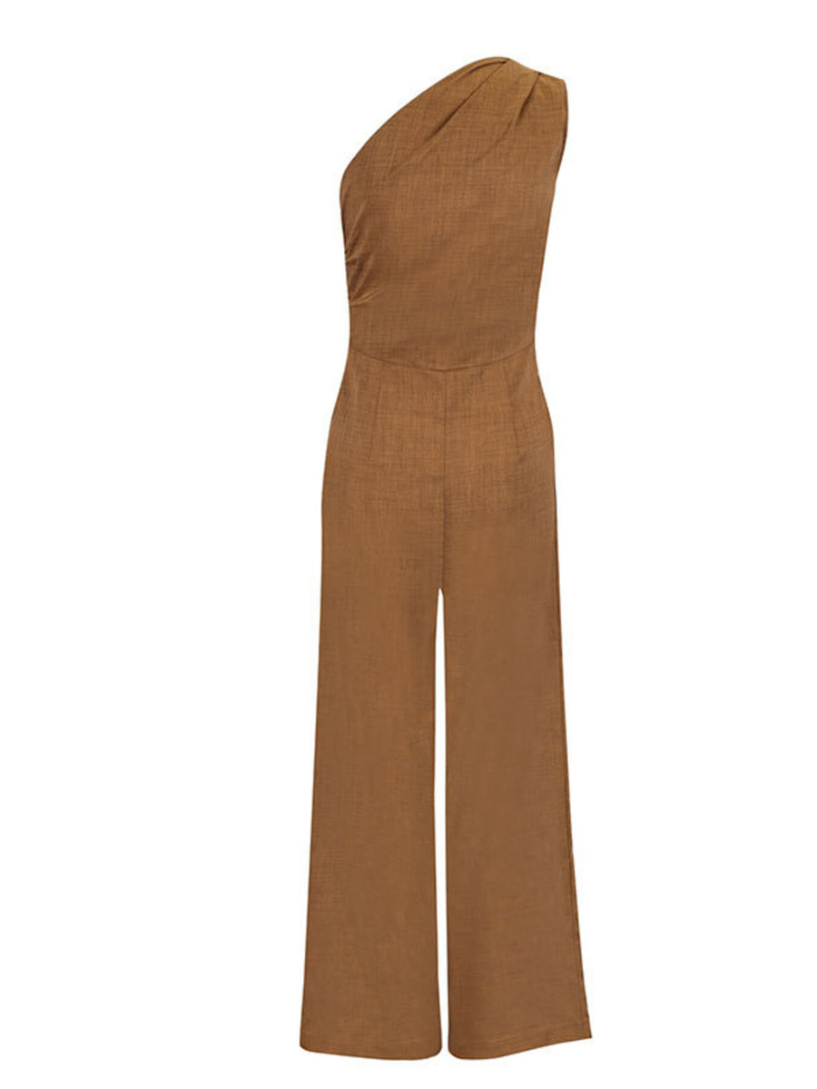 Brown one-shoulder wide leg jumpsuit with ruched detail and textured fabric.