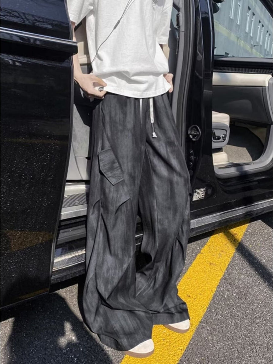 wide-leg pants in charcoal featuring drawstring waist and wide-leg fit