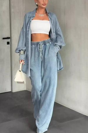 95% polyester, 5% elastane Care instructions: Machine wash cold shirt and pants set in Light Blue with relaxed silhouette