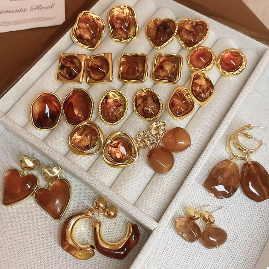amber brown earrings featuring gold-plated and geometric