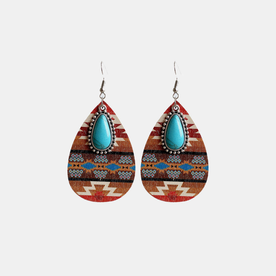 Southwestern print teardrop earrings with turquoise stone and alloy details.